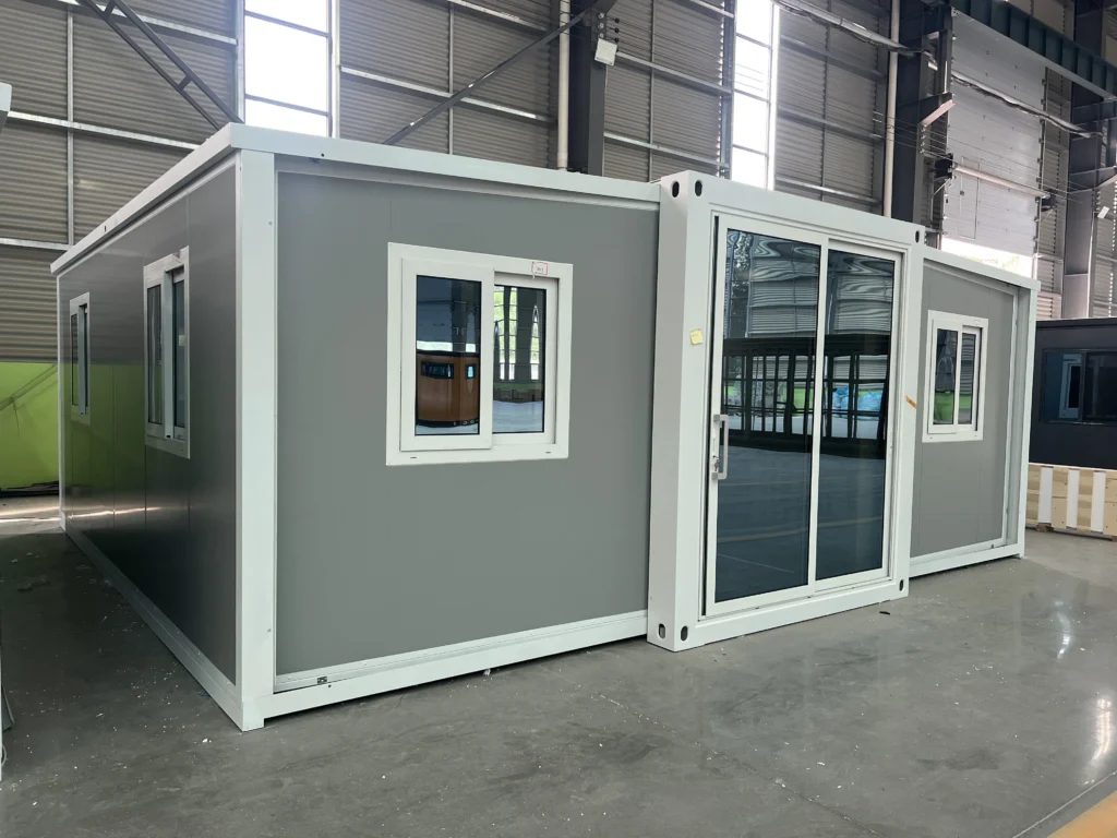 granny flat kits australia - grey steel facade of a flat-packed expandable unit