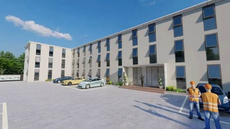 Design study — multi-storey modular dormitory block with grade-level entrance and parking.