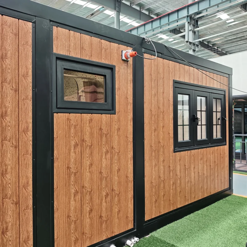 10ft expandable container house with wood-grain facade and black-framed windows