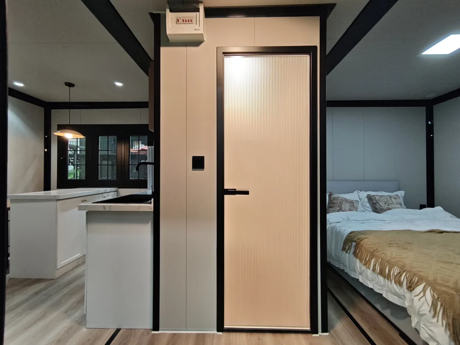 10ft expandable container house bedroom with double bed and built-in wardrobe
