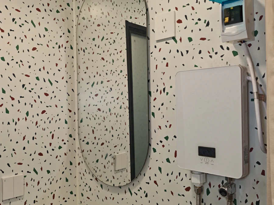 10ft expandable container house bathroom mirror and water heater detail