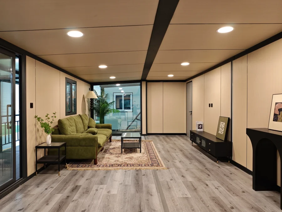 40ft expandable container house living room with green velvet sofa