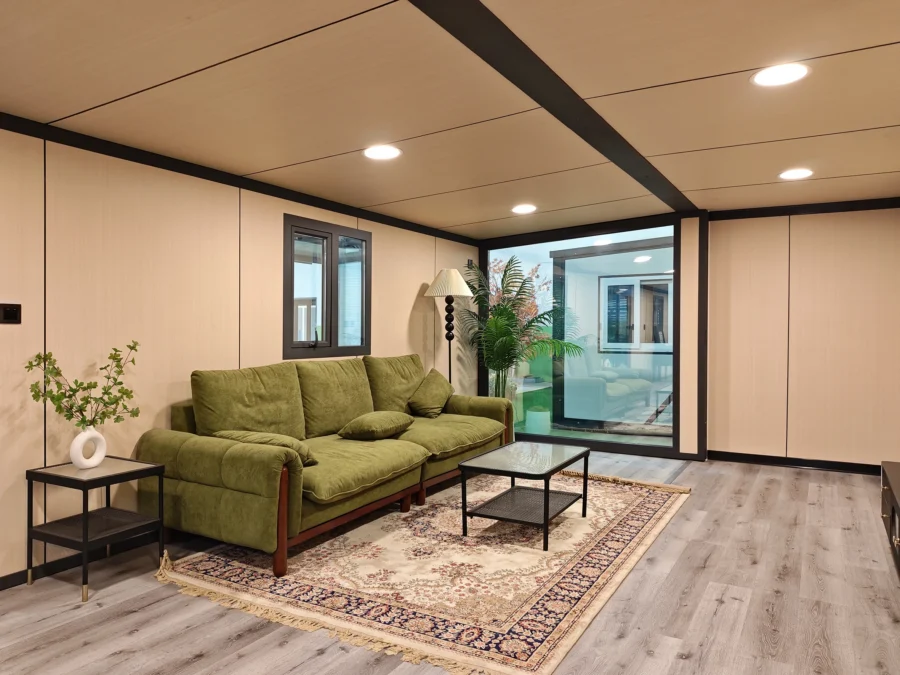 40ft expandable container house lounge opening onto the veranda