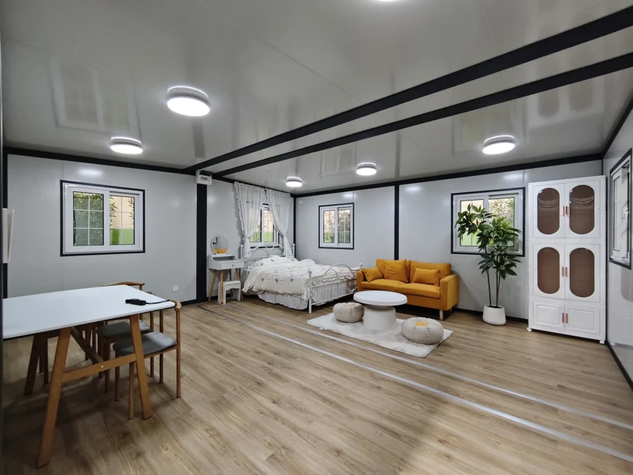 F720 compact expandable container house open-plan interior with dining table